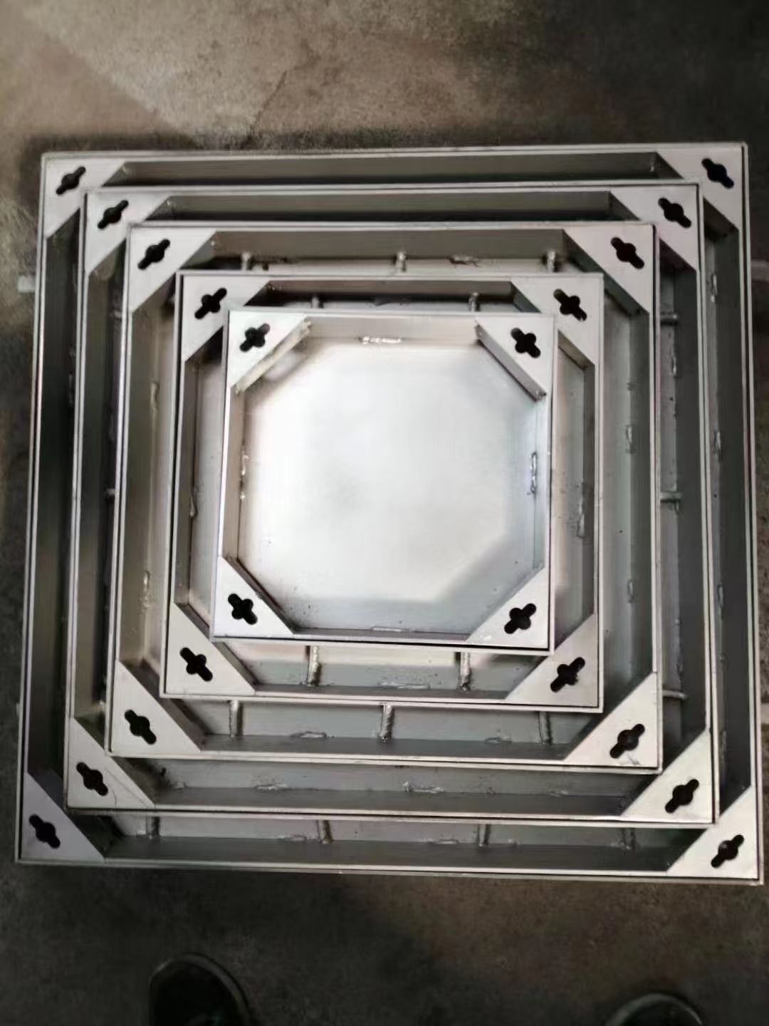 MAN HOLES